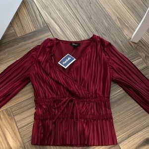 Red ruffled long sleeve top